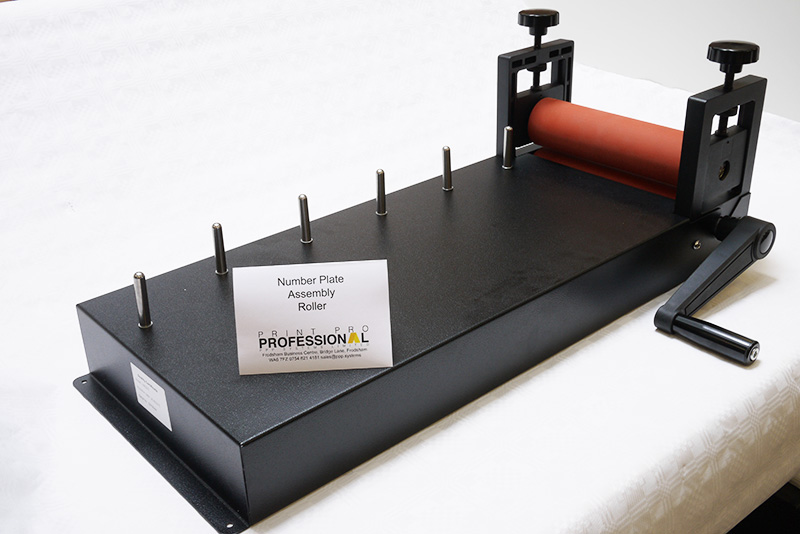 Number plate assembly jig and roller. Adjustable jaw of width 220mm (8.5in).